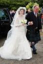 <p>Rose wore a stunning vintage-style Elie Saab wedding dress to wed <em>Game of Thrones</em> co-star Kit Harington in Scotland. The North will certainly remember this gorgeous look!</p>