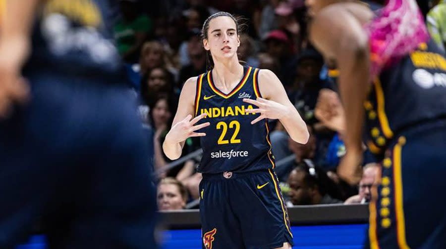The Indiana Fever’s Caitlin Clark (22) celebrates after hitting a 3-point shot in the fourth quarter of a preseason game against the Dallas Wings at College Park Center on Friday, May 3, 2024, in Arlington, Texas. (Chris Torres/Fort Worth Star-Telegram/Tribune News Service via Getty Images)