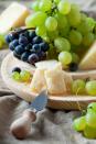 <p>Make a mini cheese board by combining 1/2 cup grapes with one piece of part-skim cheese. <span class="redactor-invisible-space">Later, nosh on one serving <a href="https://www.amazon.com/dp/B000EMX13C/ref=dp_prsubs_1?tag=syn-yahoo-20&ascsubtag=%5Bartid%7C10055.g.4994%5Bsrc%7Cyahoo-us" rel="nofollow noopener" target="_blank" data-ylk="slk:Sahale Almonds;elm:context_link;itc:0;sec:content-canvas" class="link ">Sahale Almonds</a> <span class="redactor-invisible-space">plus </span></span>1 tablespoon of peanut butter and half of a medium pear.</p>