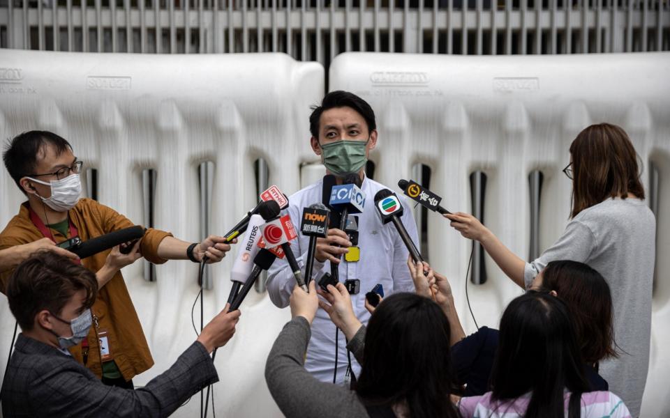 Lo Kin-hei speaks to reporters after China's Standing Committee of the National People's Congress approved major changes to the city's electoral system  - JEROME FAVRE/EPA-EFE/Shutterstock 