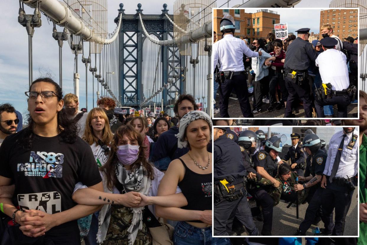 Pro-Palestinian demonstrators join arms as they block traffic on the Manhattan Bridge