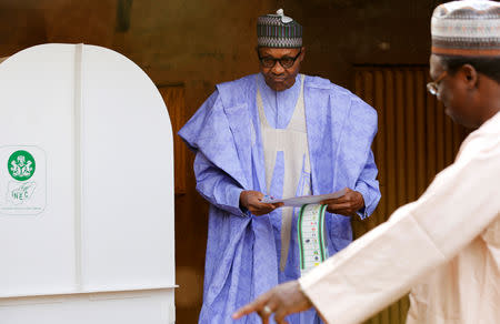 Nigerian President Muhammadu Buhari casts his vote in Nigeria's presidential election at a polling station in Daura, Katsina State, Nigeria, February 23, 2019. REUTERS/Afolabi Sotunde