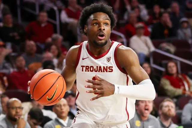 <p>Meg Oliphant/Getty</p> Bronny James #6 of the USC Trojans looks to shoot in the first half against the California Golden Bears at Galen Center on January 03, 2024 in Los Angeles, California.