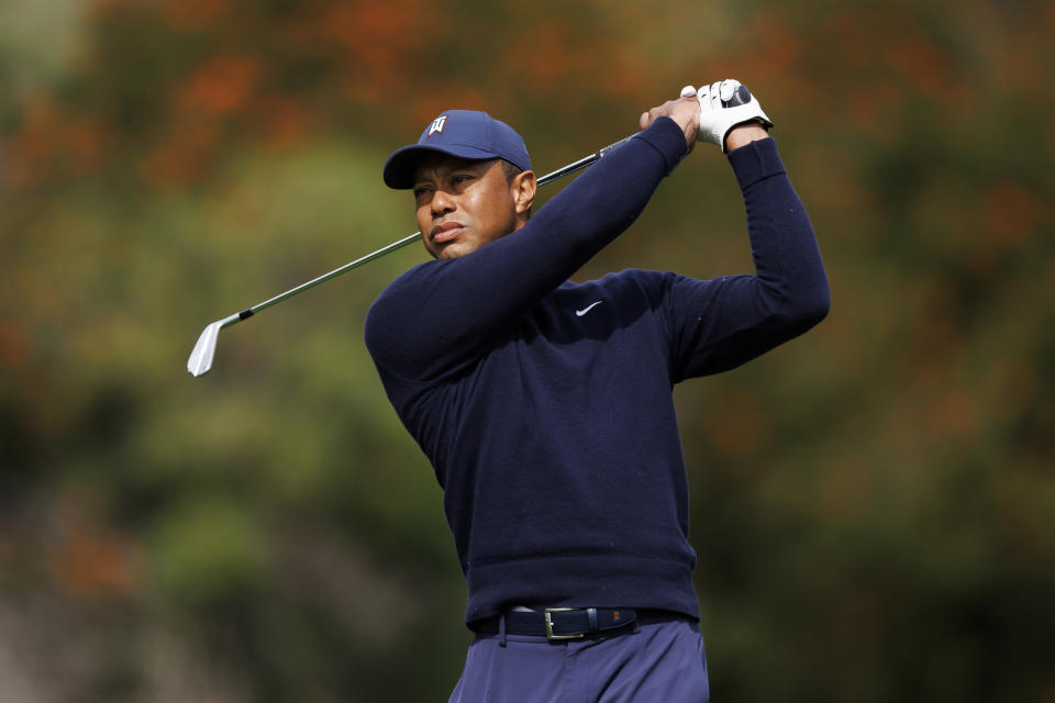 FILE - Tiger Woods gets ready to tee off on the fourth hole during the first round of the Genesis Invitational golf tournament at Riviera Country Club, Thursday, Feb. 16, 2023, in the Pacific Palisades area of Los Angeles. (AP Photo/Ryan Kang, File)