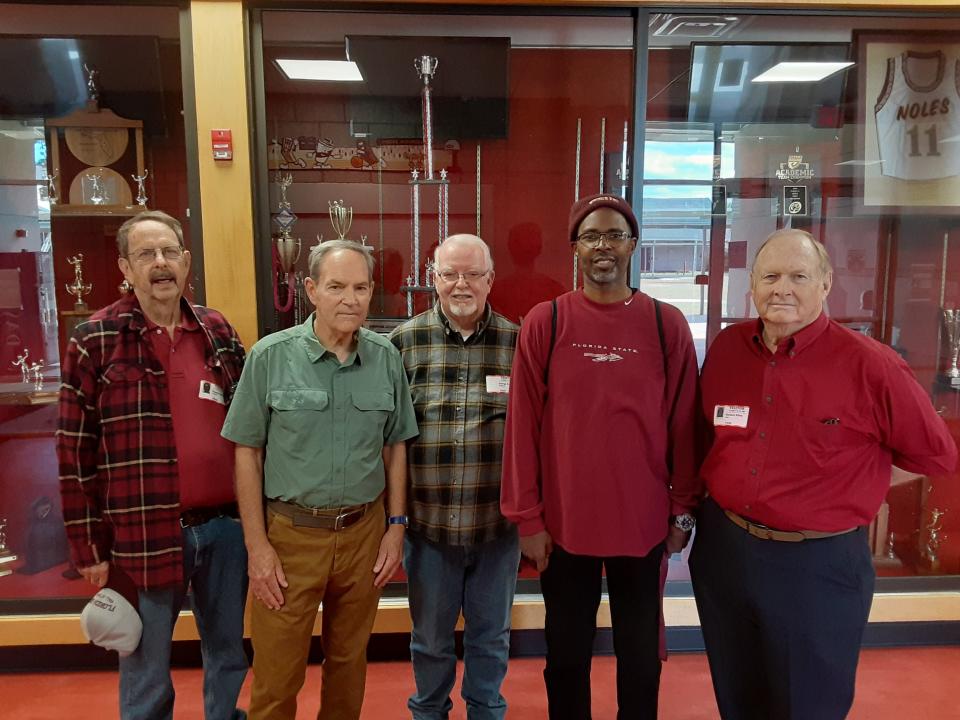 Members of Florida High's 1963 state title team with Seminoles coach Charlie Ward. From left to right, Steve Moon, Dave Ingram, George Creamer, Ward and Dick Kline.