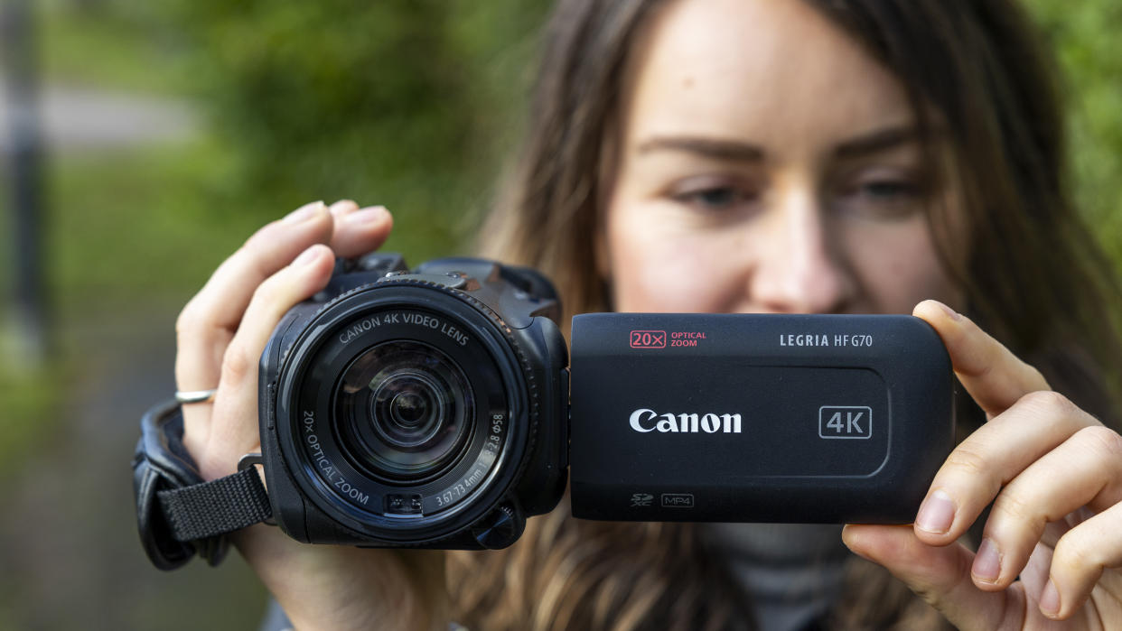  The Canon HF G70 being held by the reviewer, Lauren Scott. 