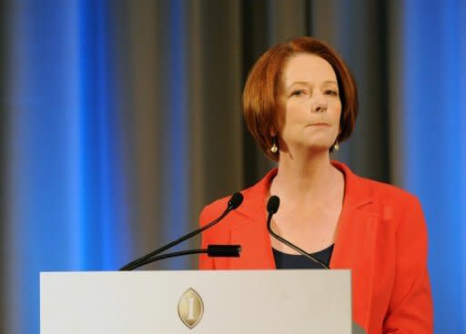 "Within a month we would hope to see people processed on Nauru and Papua New Guinea," Australian Prime Minister Julia Gillard, pictured on August 7, said, adding that she had spoken to the leaders of both nations and they responded positively to the idea