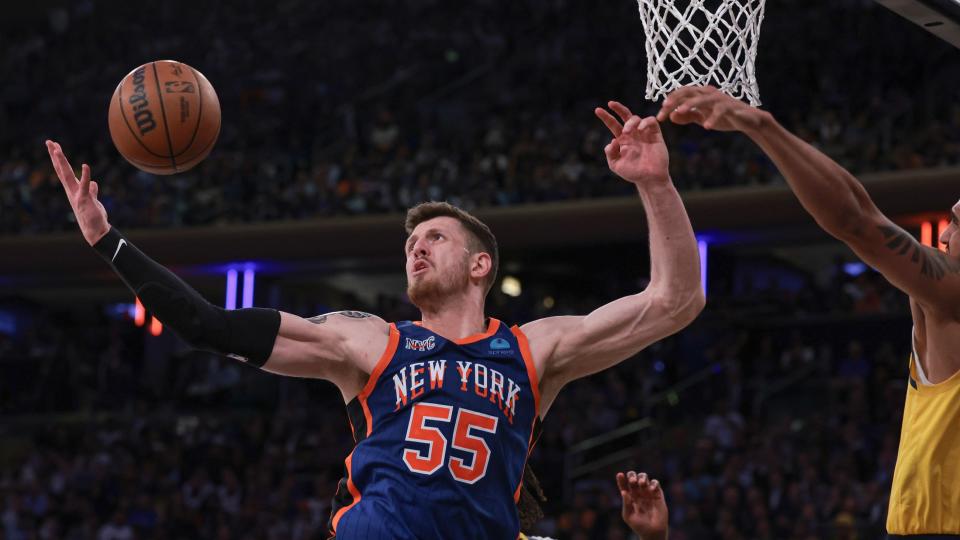 May 14, 2024; New York, New York, USA; New York Knicks center Isaiah Hartenstein (55) rebounds against Indiana Pacers forward Obi Toppin (1) during the second half during game five of the second round for the 2024 NBA playoffs at Madison Square Garden. 