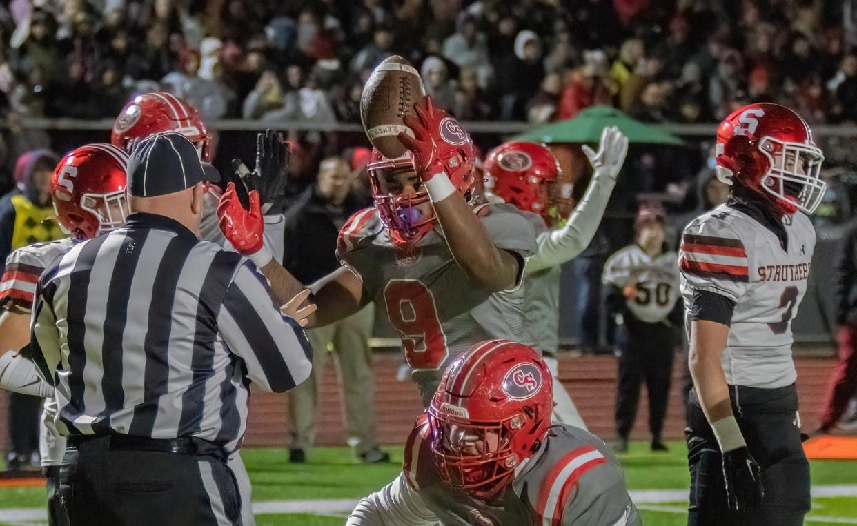 Canton South’s Rome Cox scores the first touchdown against Struthers during the first quarter Friday, Nov. 17, 2023.