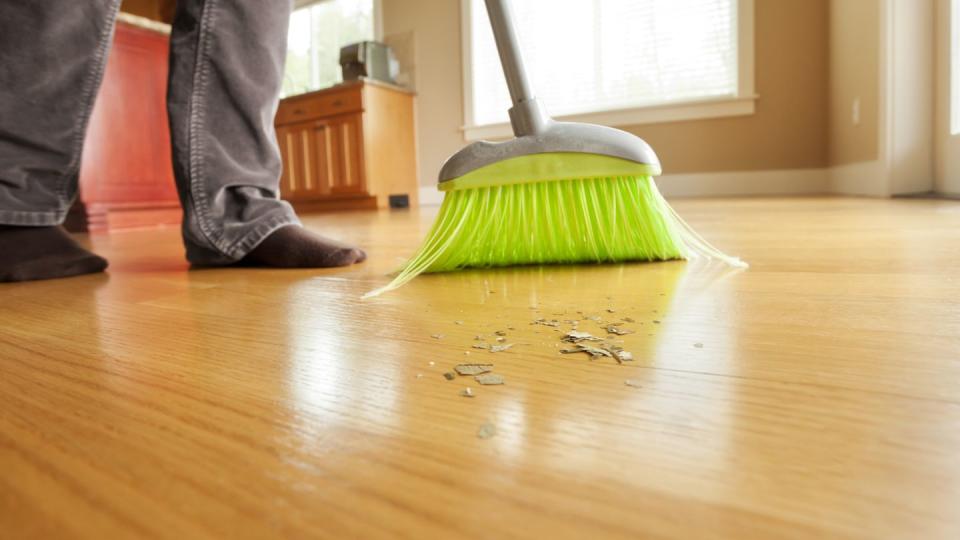 sweeping hardwood floors