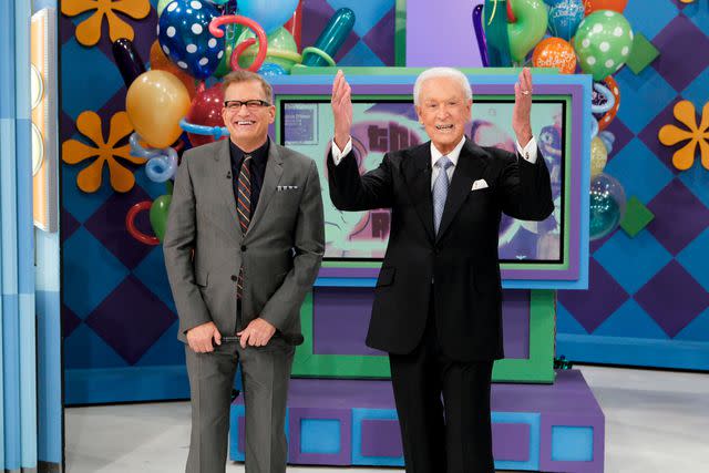 <p>Sonja Flemming/CBS via Getty</p> Drew Carey with Bob Barker on 'The Price is Right' in 2013.