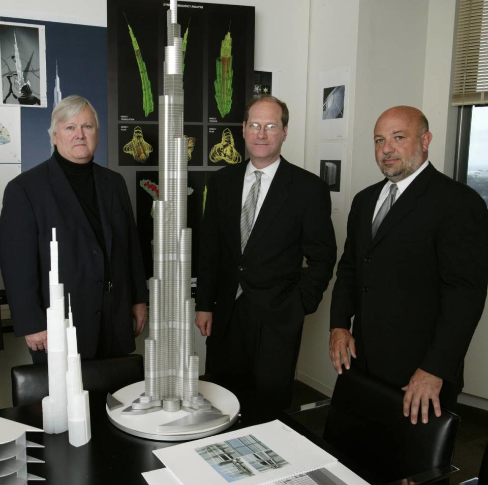 From left, Adrian Smith, the architect for the Burj Khalifa, the world’s tallest building; Bill Baker, the structural engineer for the tower; and George Efstathiou, the managing partner for the project for Skidmore, Owings & Merrill, show a model of the Burj Khalifa on March 30, 2004, at the Skidmore, Owings & Merrill’s Chicago office.