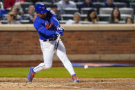 New York Mets' Eduardo Escobar hits a two-run single during the eighth inning of a baseball game against the Miami Marlins Wednesday, Sept. 28, 2022, in New York. (AP Photo/Frank Franklin II)