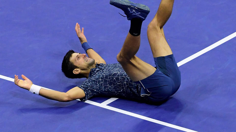 Novak Djokovic celebrates after winning his men’s Singles finals match against Juan Martin del Potro. (Photo by Steven Ryan/Getty Images)