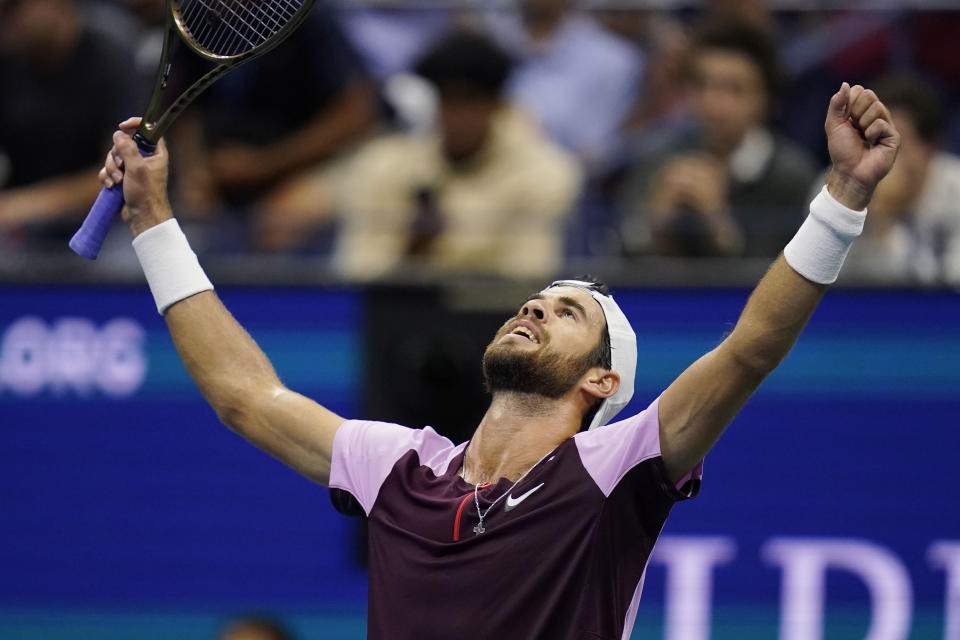 Karen Khachanov, of Russia, celebrates after defeating Nick Kyrgios, of Australia, during the quarterfinals of the U.S. Open tennis championships, Wednesday, Sept. 7, 2022, in New York. (AP Photo/Charles Krupa)