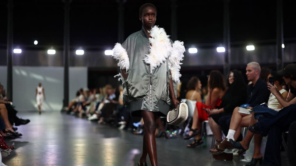 Bomber jackets bursting with feathers were another standout feature at the JW Anderson show. - Henry Nicholls/AFP/Getty Images