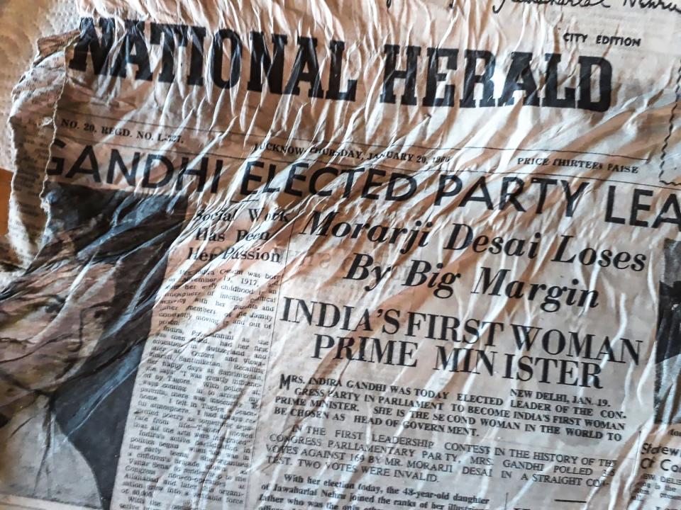 A picture taken on July 9, 2020, at the Bossons glacier near Chamonix in the French Alps, shows a 1966 copy of Indian newspaper The Herald with a healdline announcing the election of Indira Gandhi, likely to have been on board the Air India Boeing 707 "Kangchenjunga" aircraft that crashed in the nearby Mont Blanc massif on January 24, 1966. - 