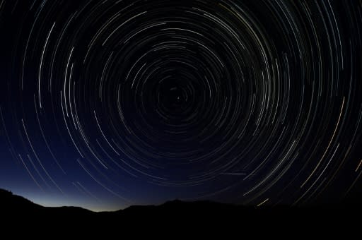 A multiple exposure picture of the Perseids meteor shower, seen over Spain