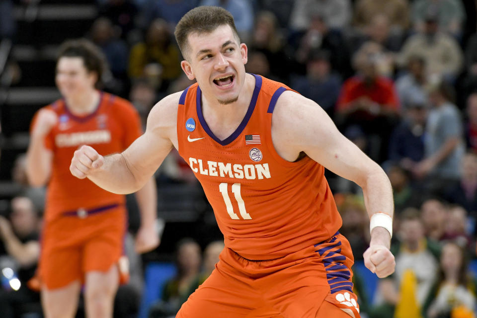 Clemson guard Joseph Girard III (11) celebrates the team's 72-64 win against Baylor in a second-round college basketball game in the NCAA Tournament, Sunday, March 24, 2024, in Memphis, Tenn. (AP Photo/Brandon Dill)