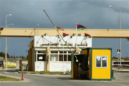 The main gate of the Mellitah Oil and Gas complex co-owned by Italy's ENI is seen, 100 km (60 miles) west of Tripoli November 7, 2013. REUTERS/Ismail Zitouny