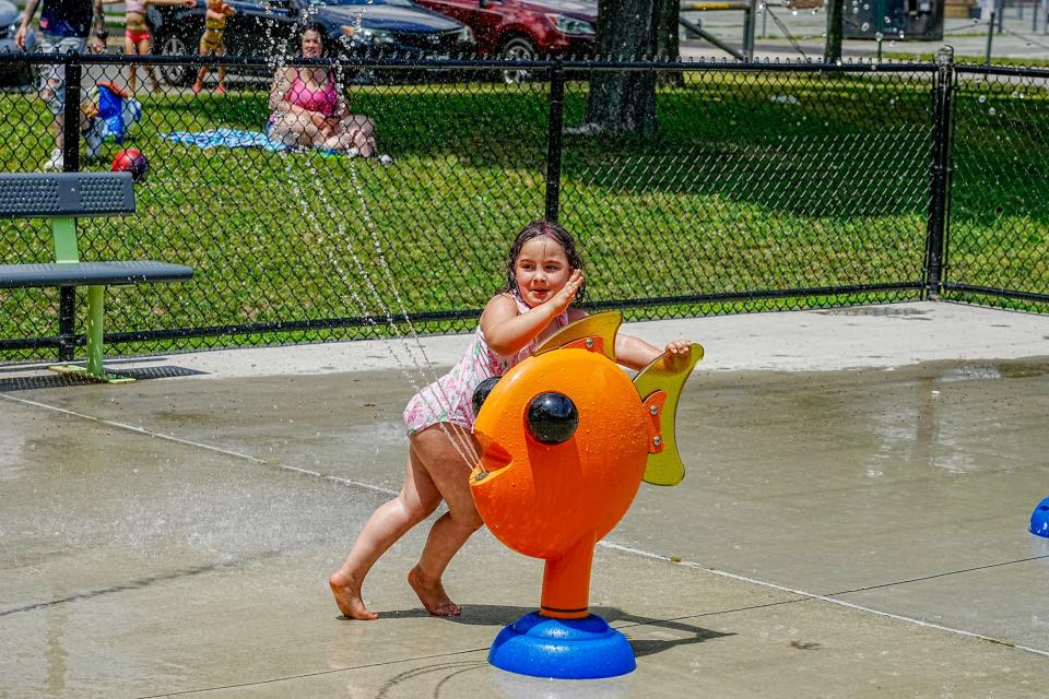 Melanie Welchman of East Providence plays in the city's splash pad at Pierce Field, 201 Mercer St., which is open seven days a week from 11 a.m. to 7 p.m.