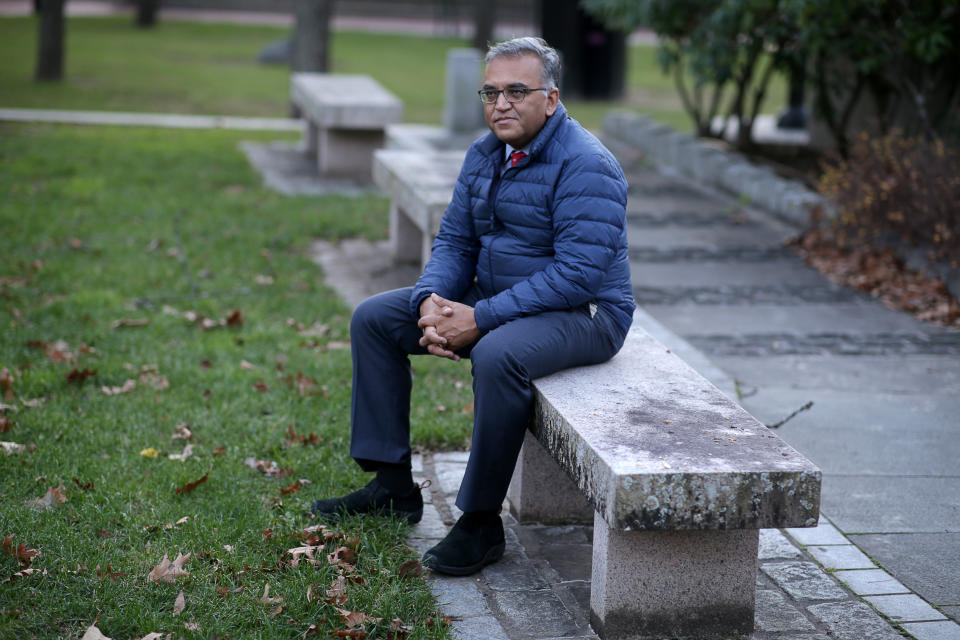 Dr. Ashish Jha is pictured in Providence, RI on Dec. 3, 2020. He is one of the most quoted experts in his field. He was doing 40 media requests a day in the spring, but has since scaled back to 15 to 20 a day. (Jonathan Wiggs/The Boston Globe via Getty Images)