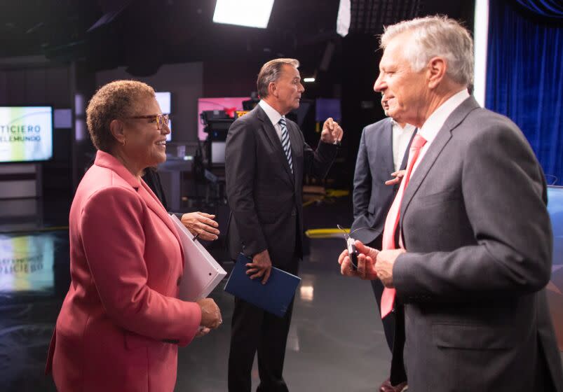 UNIVERSAL CITY, CA - OCTOBER 11: Congresswoman Karen Bass speaks with moderator and KNBC political reporter Conan Nolan following the final mayoral debate with businessman Rick Caruso at the Brokaw News Center in Universal City, CA on Tuesday, Oct. 11, 2022. (Myung J. Chun / Los Angeles Times)