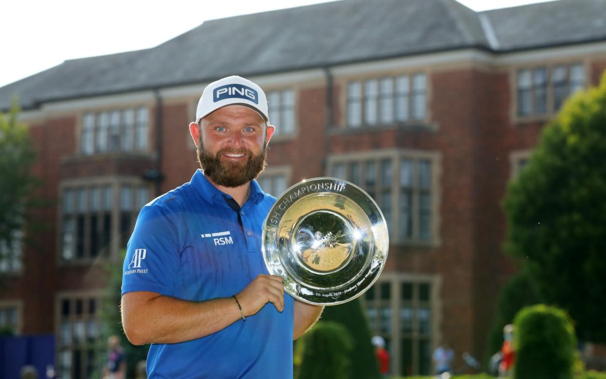 Andy Sullivan with the trophy after winning the English Championship at Hanbury Manor - GETTY IMAGES