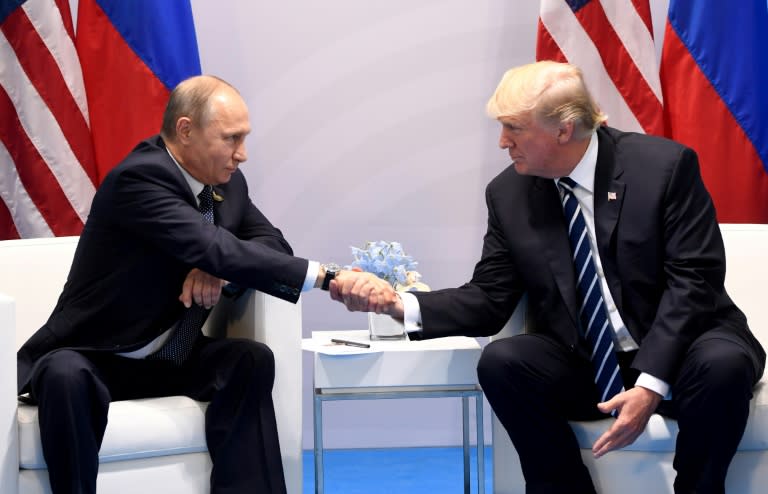 US President Donald Trump — shown here with Russia’s President Vladimir Putin at the G20 summit in Germany in July — has long argued for better ties with Moscow