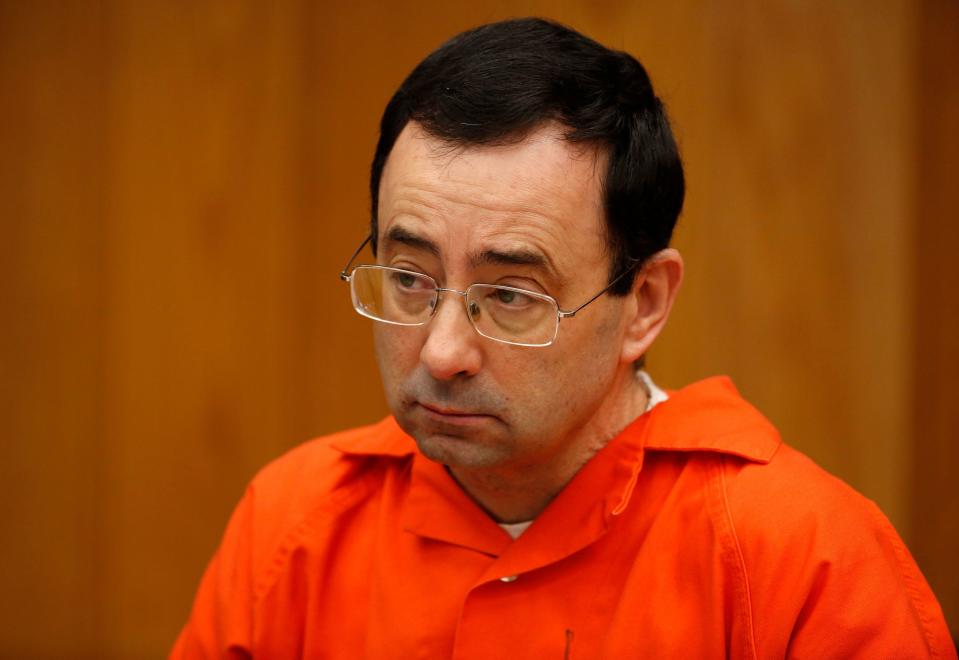 File: Former Michigan State University and USA Gymnastics doctor Larry Nassar listens during the sentencing phase in Eaton, County Circuit Court on January 31, 2018 in Charlotte, Mich.  / Credit: JEFF KOWALSKY/AFP via Getty Images