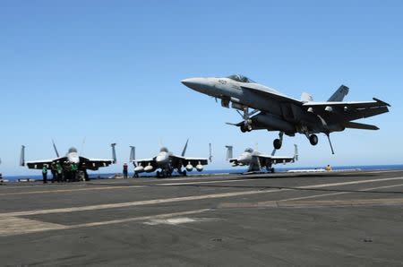 F/A-18 fighter jet takes off at the USS Harry S. Truman aircraft carrier in the eastern Mediterranean Sea. REUTERS/Andrea Shalal