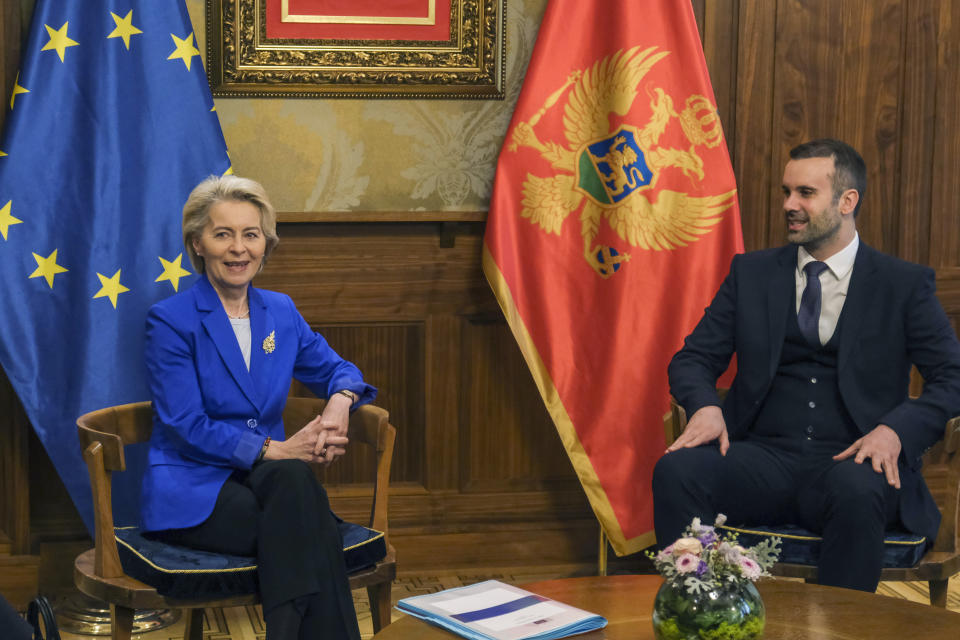 European Commission President Ursula von der Leyen, left, speaks with Montenegro's new Prime Minister Milojko Spajic in Montenegro's capital Podgorica, Tuesday, Oct. 31, 2023. Von der Leyen is on a one day official visit to Montenegro. (AP Photo/Risto Bozovic)