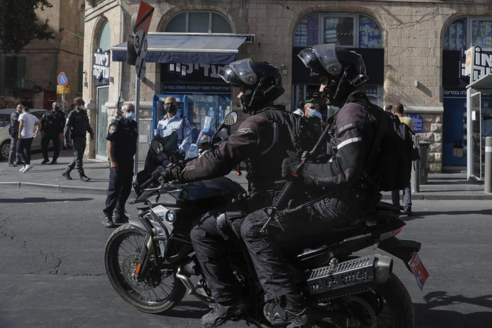 Israeli police arrive to the scene of stabbing attack in Jerusalem's Central Bus Station Monday, Sept. 13, 2021. Israeli paramedics treated two people who were stabbed near Jerusalem's Central Bus Station by a suspected Palestinian assailant on Monday. (AP Photo/Maya Alleruzzo)