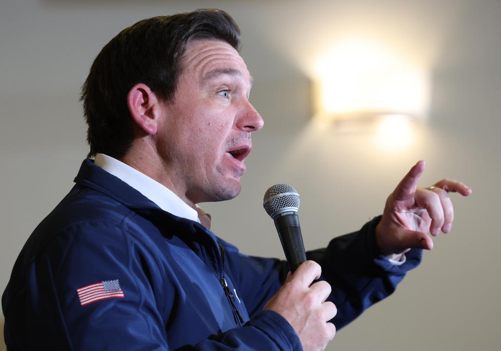 Ron DeSantis, in profile, speaks at a campaign event in Ankeny, Iowa.