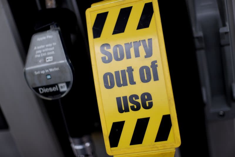 Signs show that unleaded petrol has run out at a fuel station, in Newcastle-under-Lyme