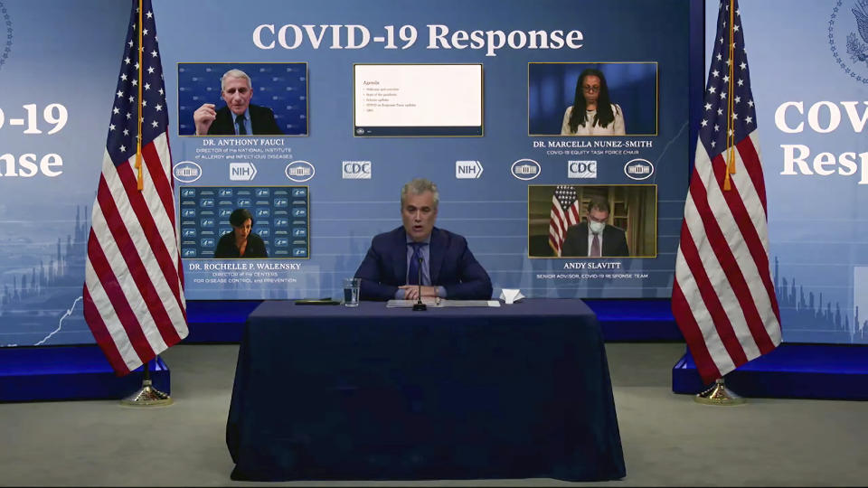 In this image from video, Jeff Zients, White House coronavirus response coordinator, speaks as Dr. Anthony Fauci, director of the National Institute of Allergy and Infectious Diseases and chief medical adviser to the president., Dr. Marcella Nunez-Smith, chair of the COVID-19 health equity task force, Dr. Rochelle Walensky, director of the Centers for Disease Control and Prevention, and Andy Slavitt, senior adviser to the White House COVID-19 Response Team,, appear on screen during a White House briefing on the Biden administration's response to the COVID-19 pandemic Wednesday, Jan. 27, 2021, in Washington. (White House via AP)