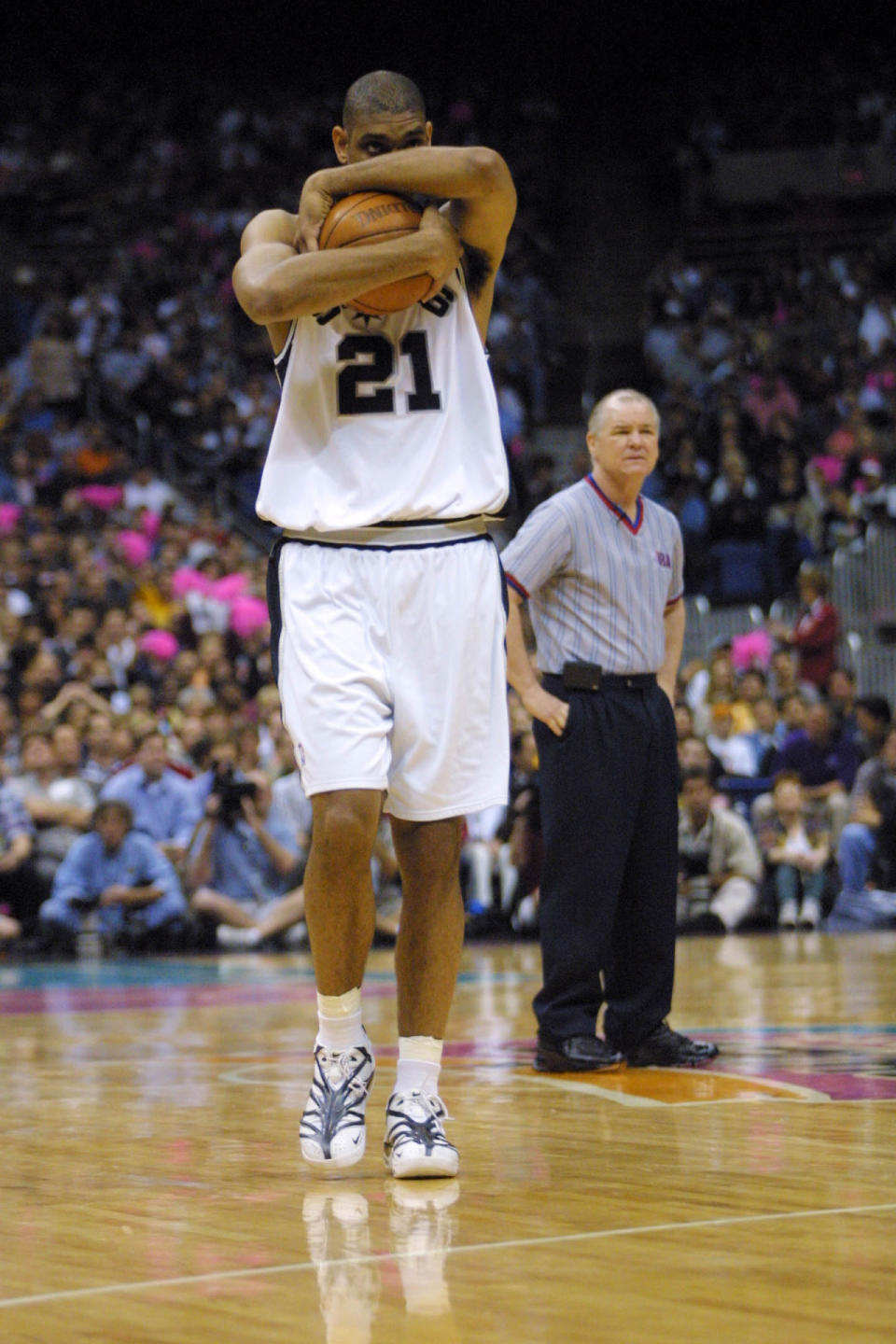 <p>2001: Tim Duncan #21 of the San Antonio Spurs during game two of round one of the NBA playoffs against the Minnesota Timberwolves at the Alamodome in San Antonio, Texas. The Spurs won 86-69. DIGITAL IMAGE. Mandatory Credit: Ronald Martinez/Allsport<br></p>