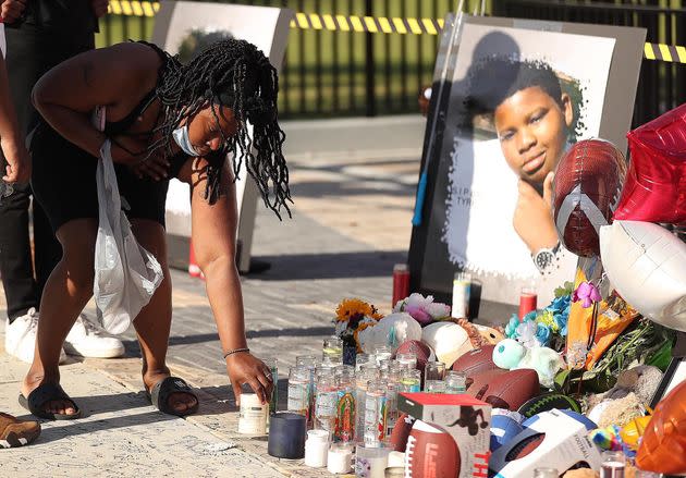 Family and friends of Tyre Sampson leave items during a vigil in front of the Orlando FreeFall drop tower on March 28. (Photo: Orlando Sentinel via Getty Images)
