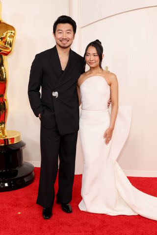 <p>Getty Images</p> Simu Liu and Allison Hsu attend the 96th Annual Academy Awards
