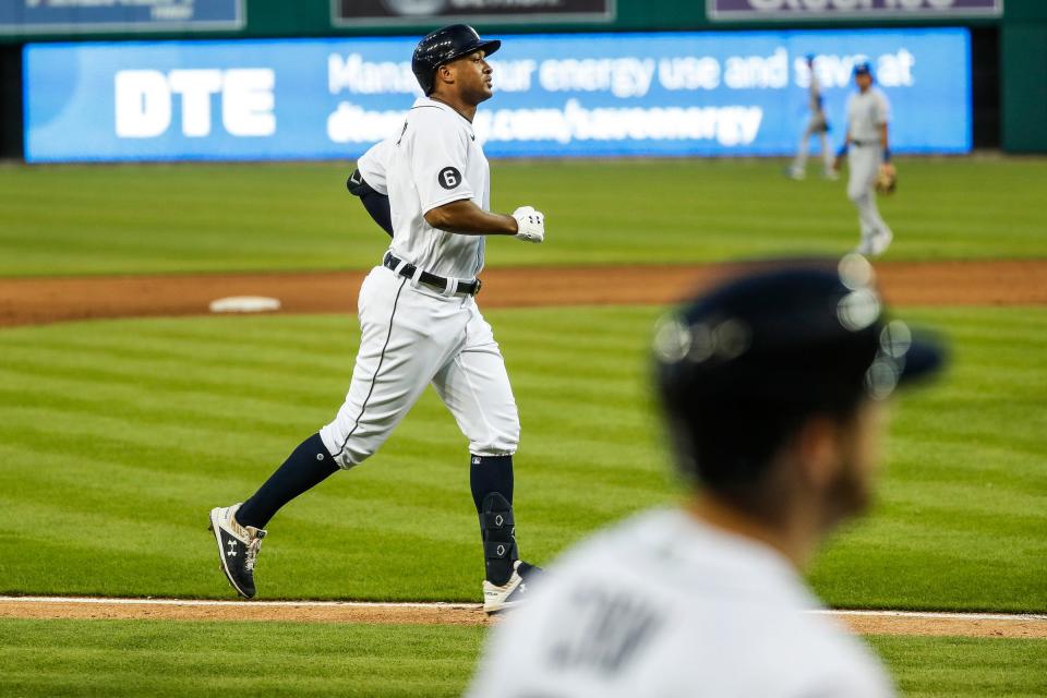 Detroit Tigers second baseman Jonathan Schoop runs towards the home plate after hitting a two-run home run against Kansas City Royals during the fifth inning at Comerica Park in Detroit, Wednesday, July 29, 2020.