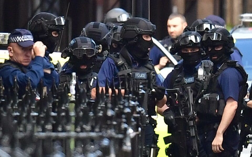 Armed police on St Thomas Street - Credit: Dominic Lipinski/PA Wire