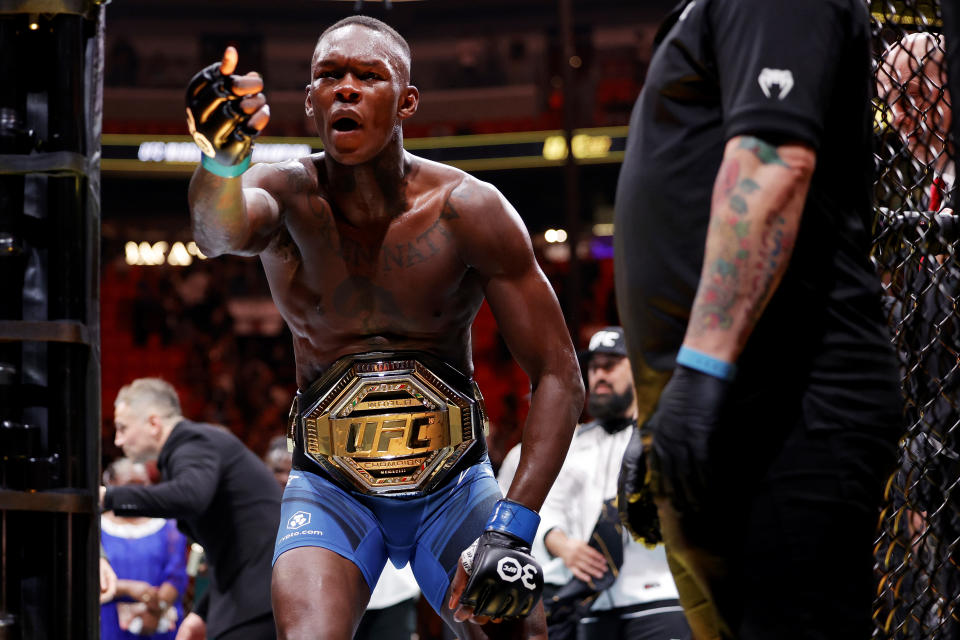 Israel Adesanya celebrated after knocking out Alex Pereira to reclaim the middleweight title during UFC 287 at Kaseya Center on April 8, 2023, in Miami. (Carmen Mandato/Getty Images)