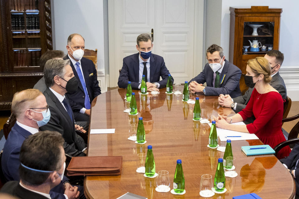 U.S. Secretary of State Antony Blinken, third left, and Estonian Prime Minister Kaja Kallas, right, attend the talks, in Tallinn, Estonia, on Tuesday, March 8, 2022. Blinken was meeting with senior Estonian officials in Tallinn on Tuesday, a day after hearing appeals from both Lithuania and Latvia for more support and greater U.S. and NATO troop presence to deter a feared Russian intervention. (AP Photo/Raul Mee)