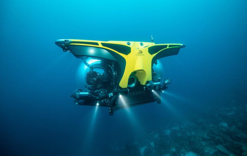 A yellow submersible near the sea floor