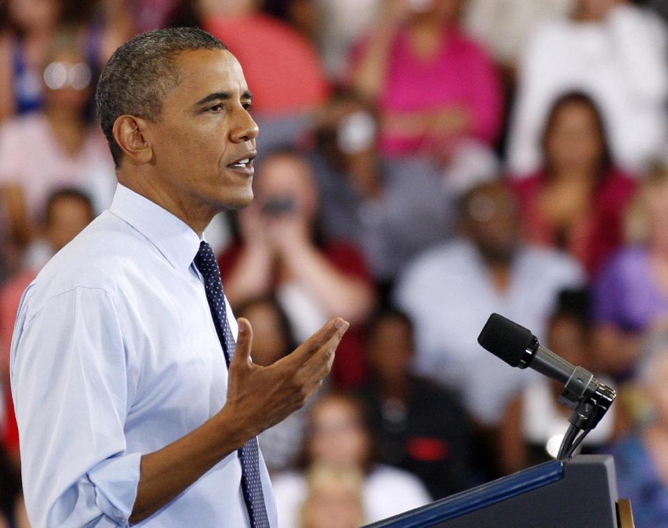 FILE - In this Aug. 22, 2012 file photo, President Barack Obama speaks during a campaign stop in North Las Vegas, Nev. Barack Obama needs to remind voters why they loved him in 2008. Mitt Romney needs for voters to get to know and like him better And both must strike a balance with their conventions to fire up core backers without alienating undecided voters who may well decide a close election. (AP Photo/Isaac Brekken, File)