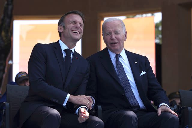 <p>AP Photo/Daniel Cole</p> President Joe Biden and French President Emmanuel Macron during the commemorative ceremony to mark D-Day 80th anniversary.