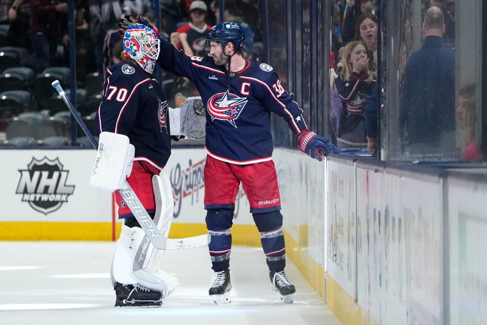 Blue Jackets goaltender Joonas Korpisalo, left, improved his save percentage to .910 with a 37-save victory Thursday against the Jets.