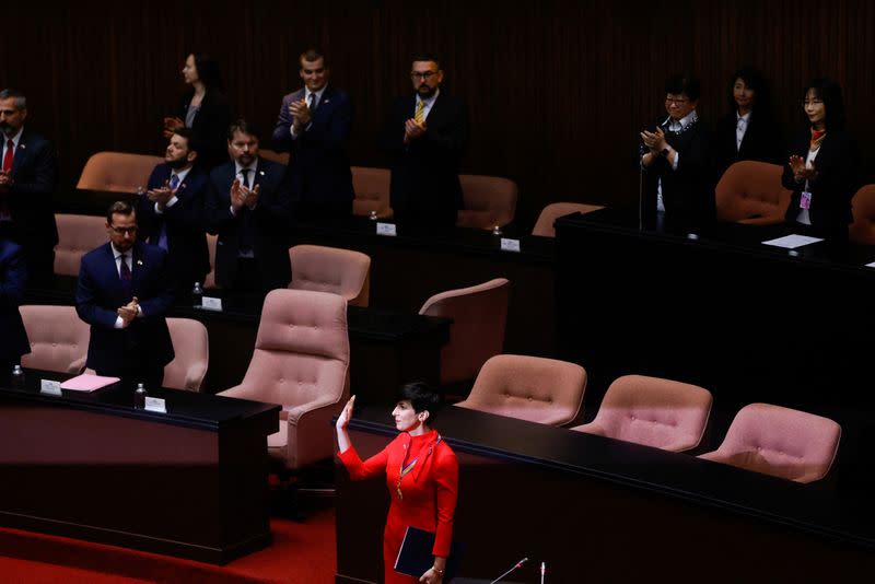 The Speaker of the Chamber of the Deputies of Czech Republic Marketa Pekarova Adamova waves to the media at the Parliament in Taipei