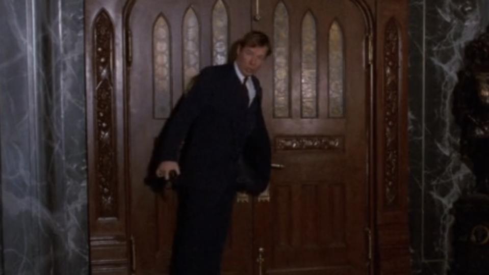 Mr. Green opening the door in Clue