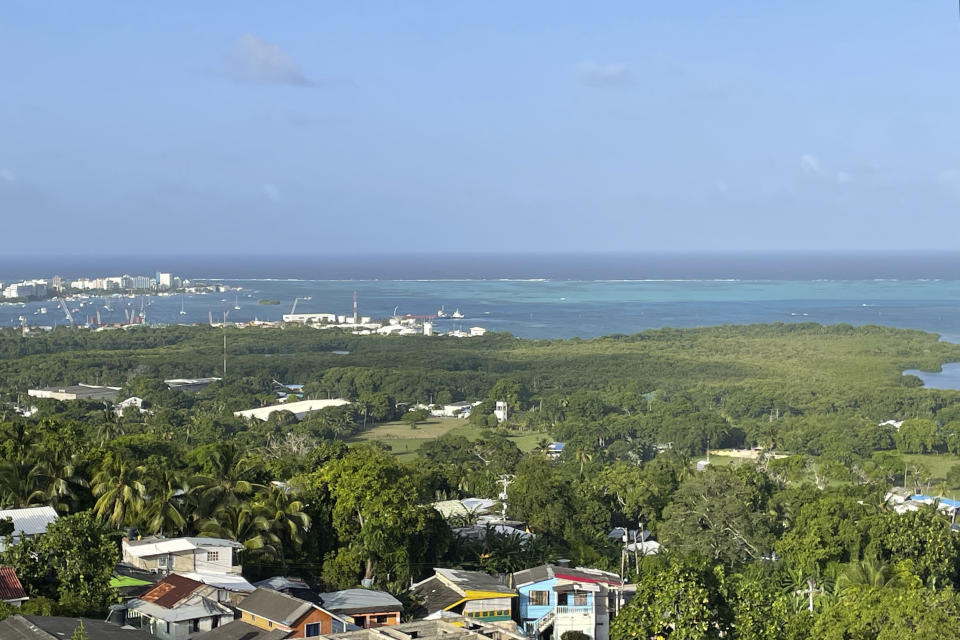 Colombia's San Andres Island is seen from a mirador on the steeple of First Baptist Church on Thursday, Aug. 18, 2022. Over a century after being claimed by Spain, San Andres was first settled in the 1630s by English Puritans. It later became an outpost for pirates and today is home to many descendants of Puritans and African slaves, and also large numbers of more recent arrivals from mainland Colombia. (AP Photo/Luis Andres Henao)